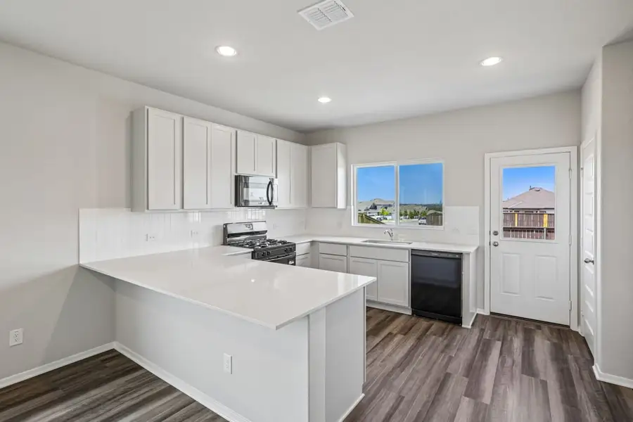 Furnished interior view inside a new home in Cloverleaf, Austin (Image 6).