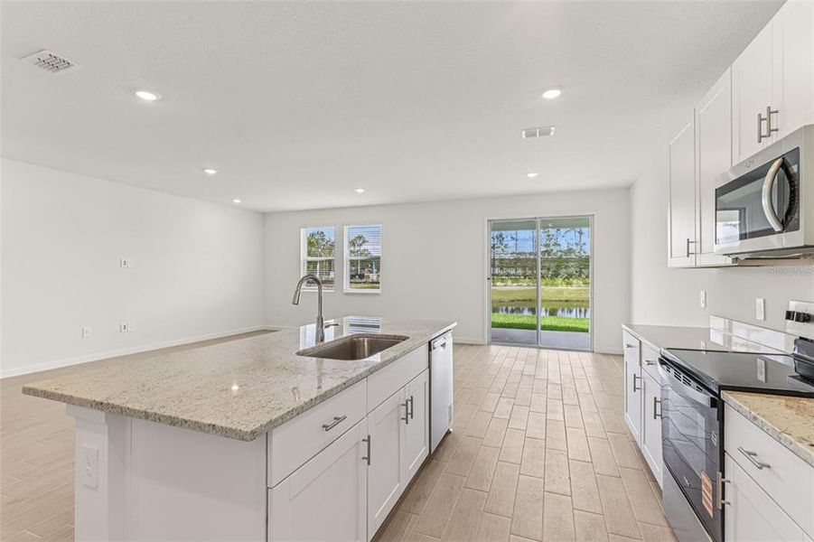 Furnished interior view inside a new home in Colbert Landings, Palm Coast (Image 7).