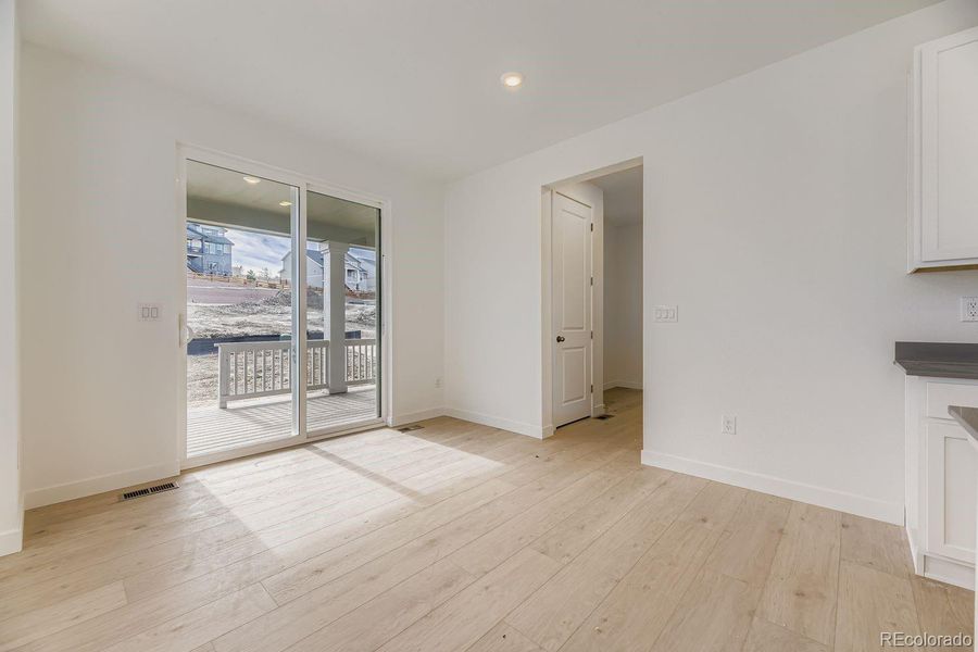 Spacious, unfurnished interior of a new home in Ken-Caryl Ranch: The Monarch Collection, Littleton (Image 9).