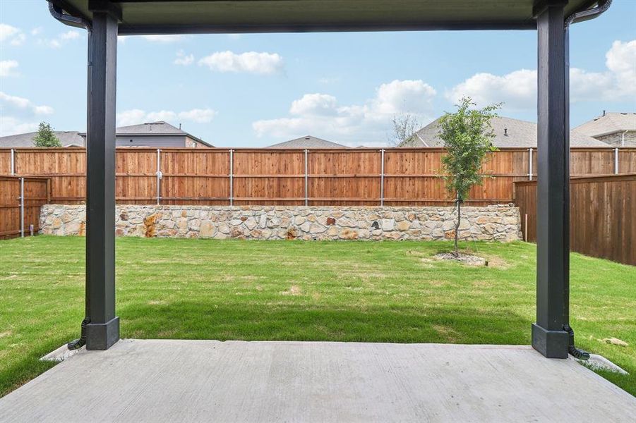 Exterior details and patio area of a home in Overland Grove, Forney (Image 19).