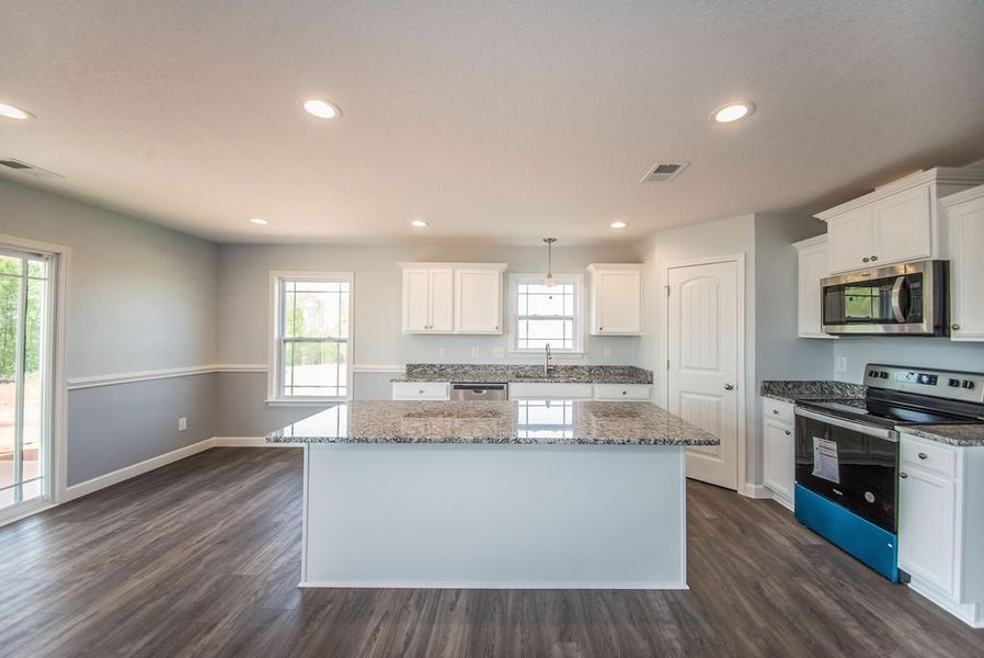 Representative furnished interior of a home built from the Franklin by Enchanted Homes in Guadalupe Heights, Seguin (Image 14).