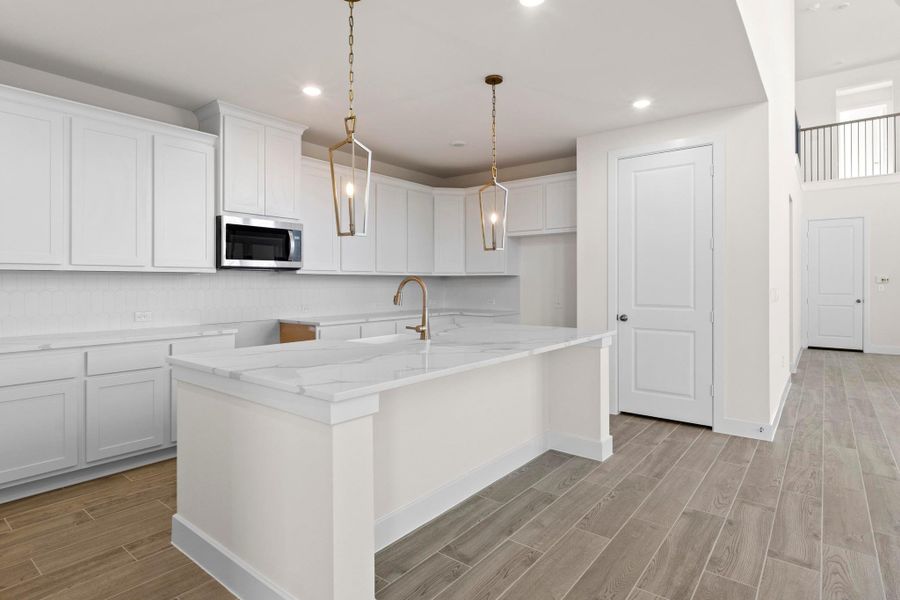 Furnished interior view inside a new home in Parmer Ranch, Georgetown (Image 10).