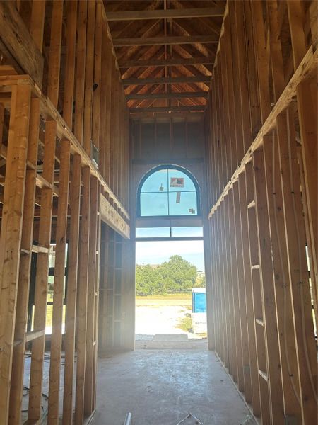 Miscellaneous room featuring a towering ceiling Miscellaneous room featuring a towering ceiling