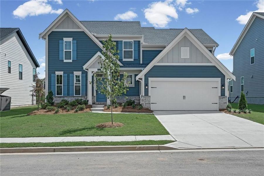 Front exterior of a new home in Twin Lakes, Hoschton, GA, highlighting curb appeal (Image 22).