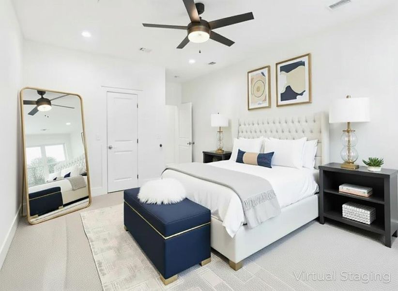 Bedroom featuring recessed lighting, ceiling fan, and carpet floors Bedroom featuring recessed lighting, ceiling fan, and carpet floors