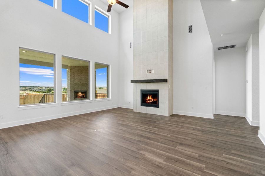 Family Room with soaring ceiling & fireplace Family Room with soaring ceiling & fireplace