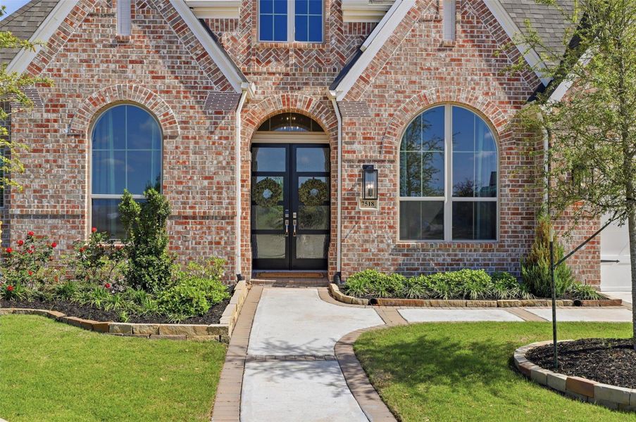 Exterior details and patio area of a home in Elyson, Katy (Image 23).