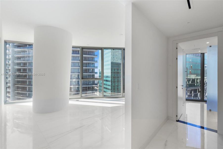 Spacious, unfurnished interior of a new home in Aston Martin Residences, Miami (Image 23). Spacious, unfurnished interior of a new home in Aston Martin Residences, Miami (Image 23).