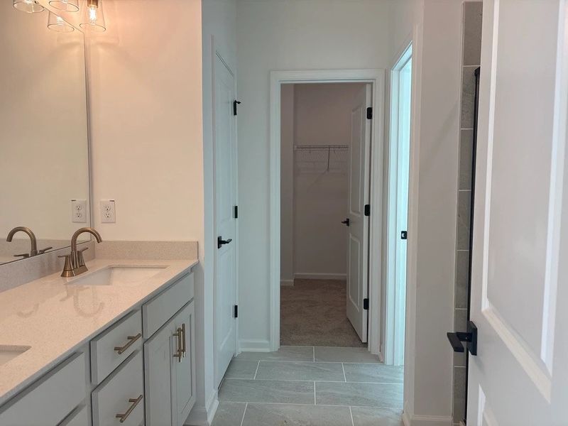 Primary Bath featuring the AW Collection® Serene - Clean forms offer quiet luxury.