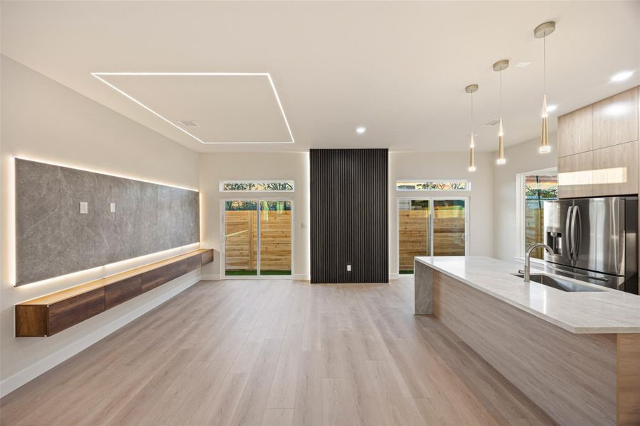 Living room opens straight to the backyard Living room opens straight to the backyard