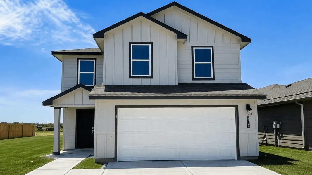 Front exterior of a new home in Flagstop Crossing, Odem, TX, highlighting curb appeal (Image 1). Front exterior of a new home in Flagstop Crossing, Odem, TX, highlighting curb appeal (Image 1).