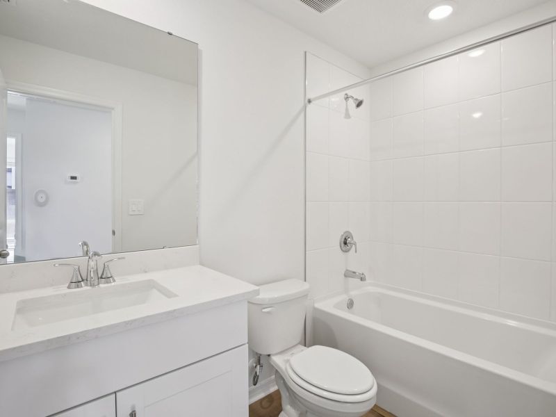 Furnished interior view inside a new home in Oakfield Trails - Premier Series, Parrish (Image 6).