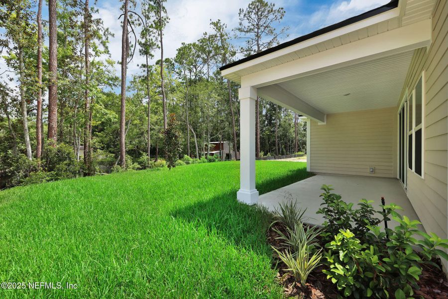 Exterior details and patio area of a home in Creighton Pointe, Fleming Island (Image 3). Exterior details and patio area of a home in Creighton Pointe, Fleming Island (Image 3).