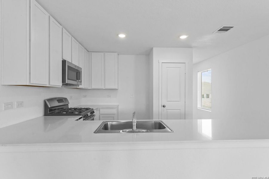 Furnished interior view inside a new home in Spring Grove, St. Hedwig (Image 10).