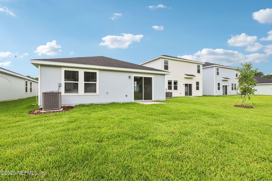 Front exterior of a new home in Kings Crossing, Jacksonville, FL, highlighting curb appeal (Image 2). Front exterior of a new home in Kings Crossing, Jacksonville, FL, highlighting curb appeal (Image 2).