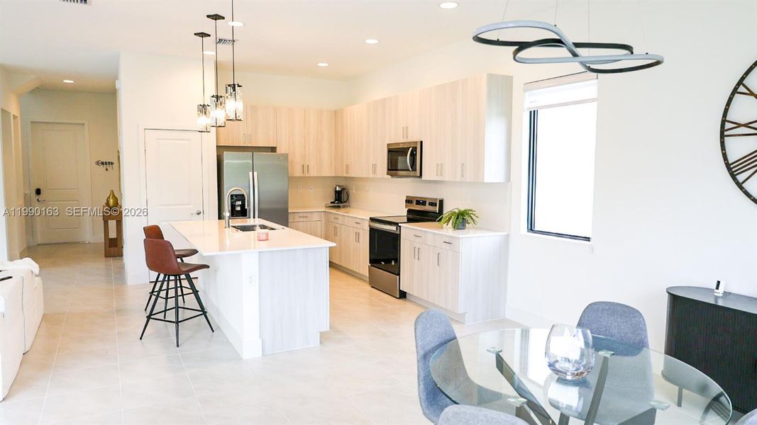 Furnished interior view inside a new home in , Ave Maria (Image 9).