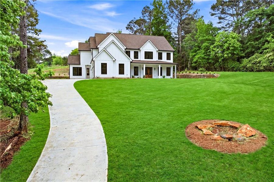 Front exterior of a new home in , Monroe, GA, highlighting curb appeal (Image 25).