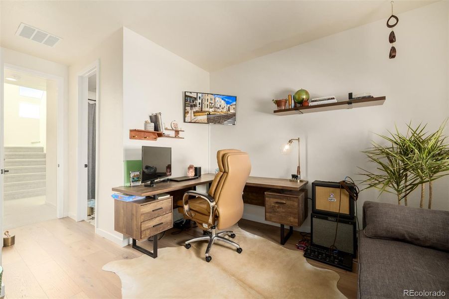 Furnished interior view inside a new home in Haskins Station, Arvada (Image 14).