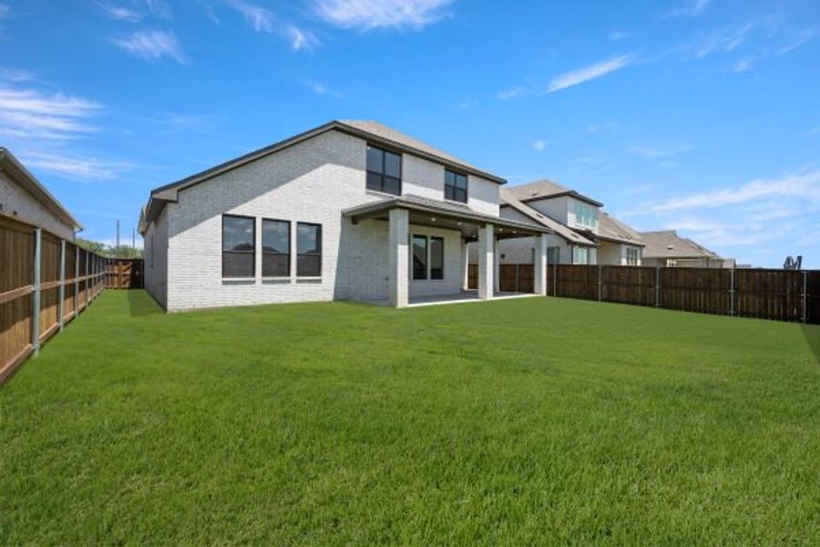 Exterior details and patio area of a home in Rio Vista at Kelly Ranch, Aledo (Image 3). Exterior details and patio area of a home in Rio Vista at Kelly Ranch, Aledo (Image 3).