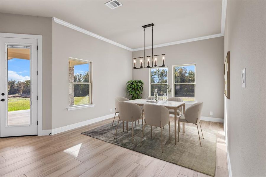 Virtually staged dining room. Virtually staged dining room.
