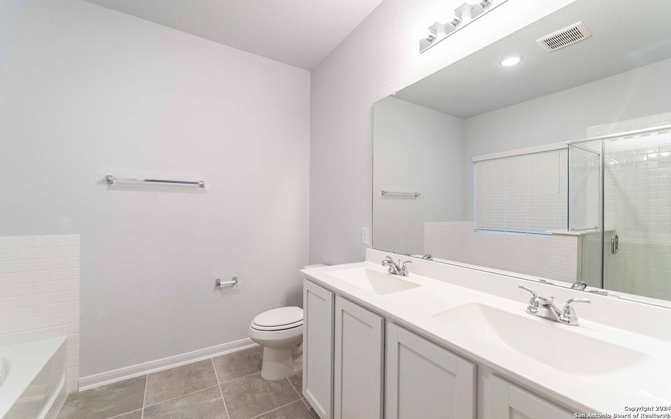 Furnished interior view inside a new home in Hannah Heights, Seguin (Image 4).
