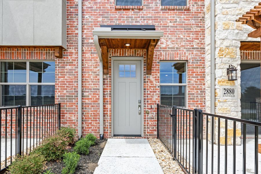Exterior details and patio area of a home in The Tribute, The Colony (Image 26). Exterior details and patio area of a home in The Tribute, The Colony (Image 26).