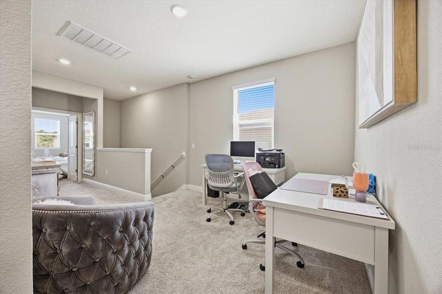 Furnished interior view inside a new home in Highland Ridge, Winter Garden (Image 18).