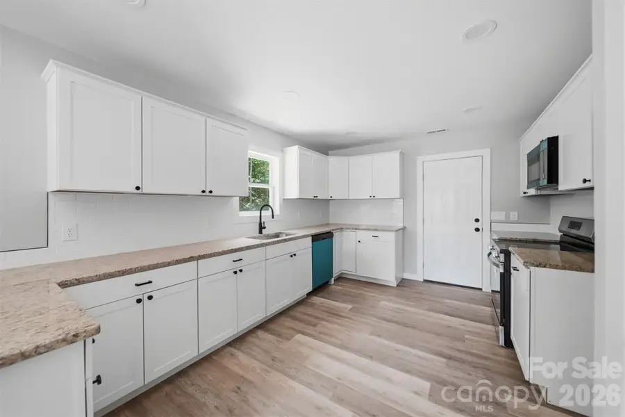 Furnished interior view inside a new home in , Conover (Image 5).