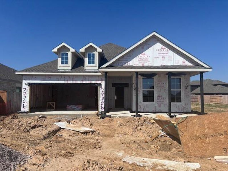 In-progress construction of a new home in Sunterra, Katy, TX (Image 27).