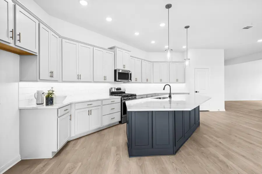 Furnished interior view inside a new home in The Grand Prairie 50’, Hockley (Image 11).