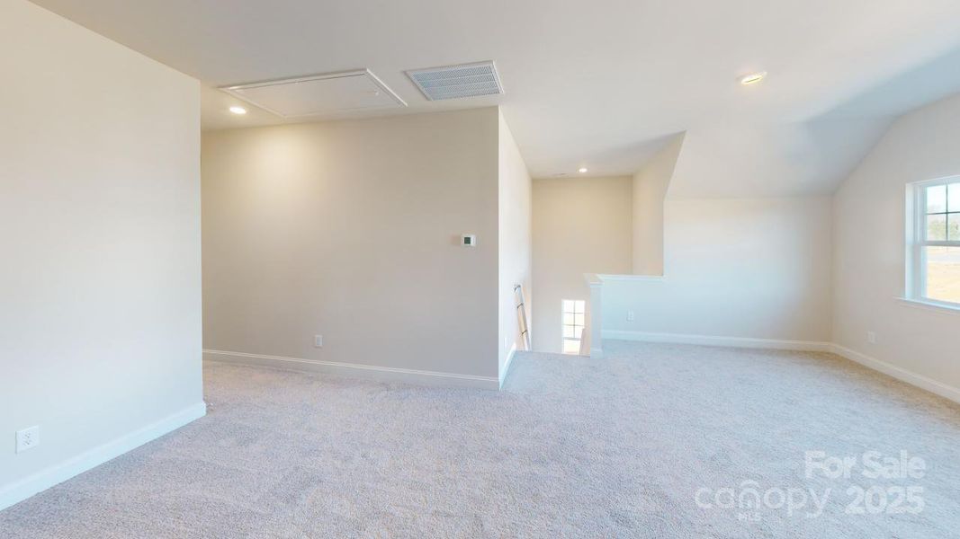 Spacious, unfurnished interior of a new home in Edgewood Preserve, Huntersville (Image 16).
