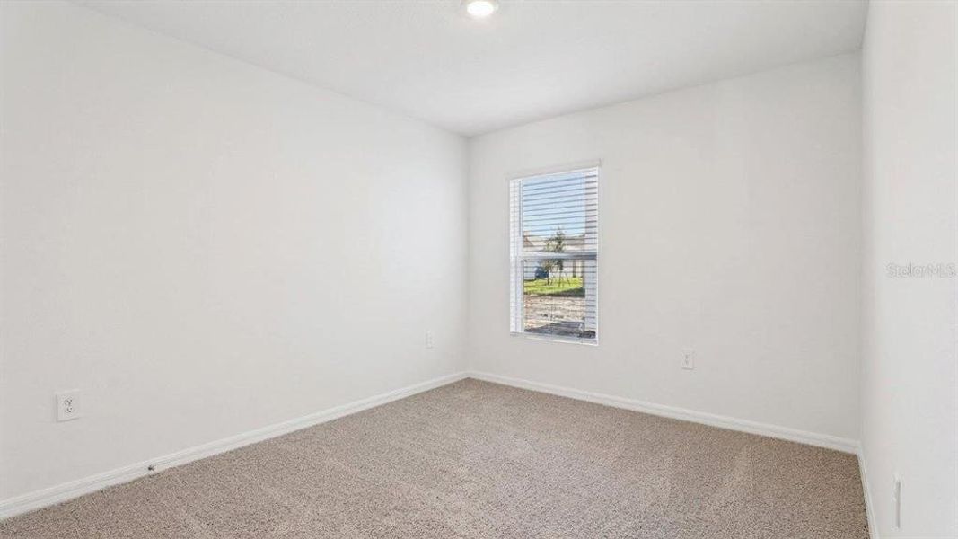 Spacious, unfurnished interior of a new home in Villamar, Winter Haven (Image 15).