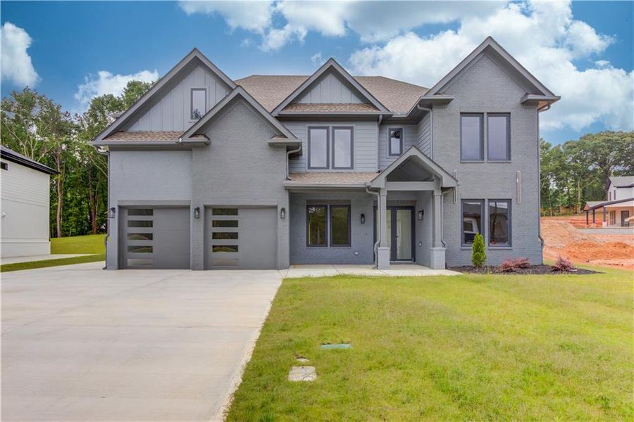 Front exterior of a new home in , Auburn, GA, highlighting curb appeal (Image 25).