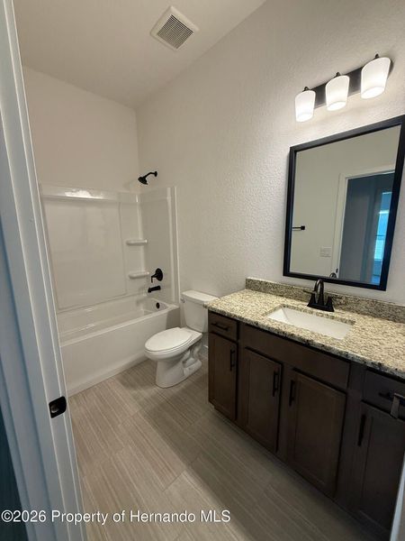 Furnished interior view inside a new home in Winding Oaks, Weeki Wachee (Image 4).