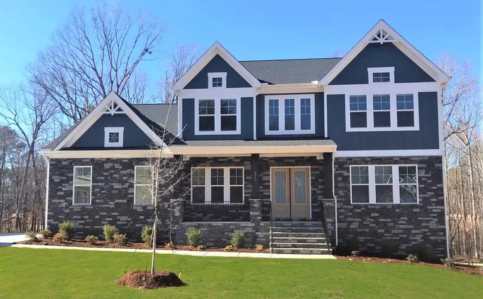 Representative exterior photo of a completed home built from the Lexington II by Caruso Homes in Sauls Landing, Zebulon, NC (Image 2). Representative exterior photo of a completed home built from the Lexington II by Caruso Homes in Sauls Landing, Zebulon, NC (Image 2).