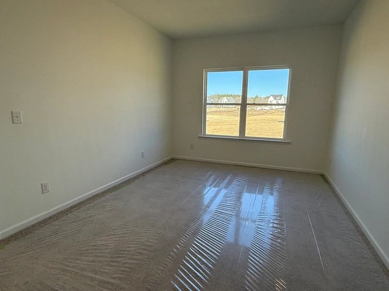 Guest Bed featuring the AW Collection® Coastal - Light-filled and calm, ideal for guests or family.