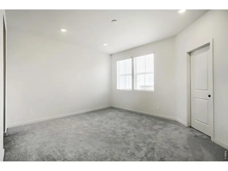 Spacious, unfurnished interior of a new home in Riano Ridge, Loveland (Image 10).