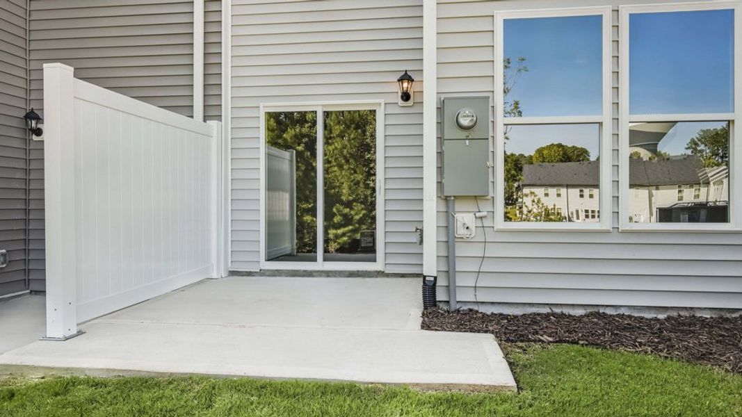 Exterior details and patio area of a home in Chapel Townes, Raleigh (Image 27).