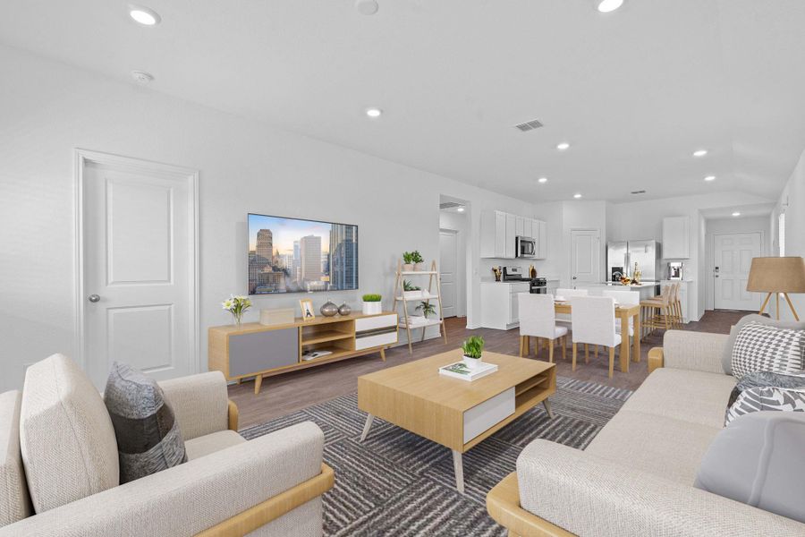 Living room with recessed lighting and dark wood finished floors