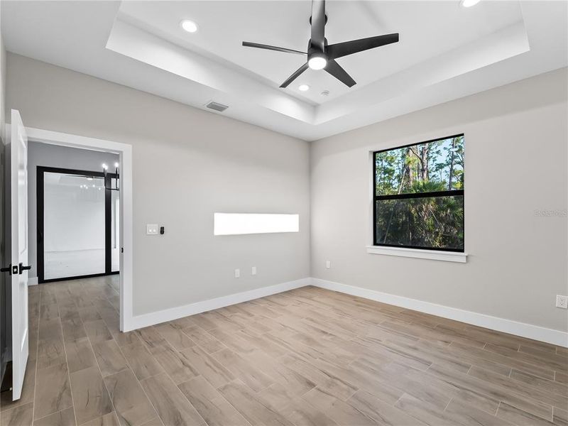 Spacious, unfurnished interior of a new home in , Port Charlotte (Image 50).