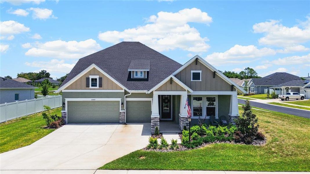Front exterior of a new home in Carmela, San Antonio, FL, highlighting curb appeal (Image 2). Front exterior of a new home in Carmela, San Antonio, FL, highlighting curb appeal (Image 2).