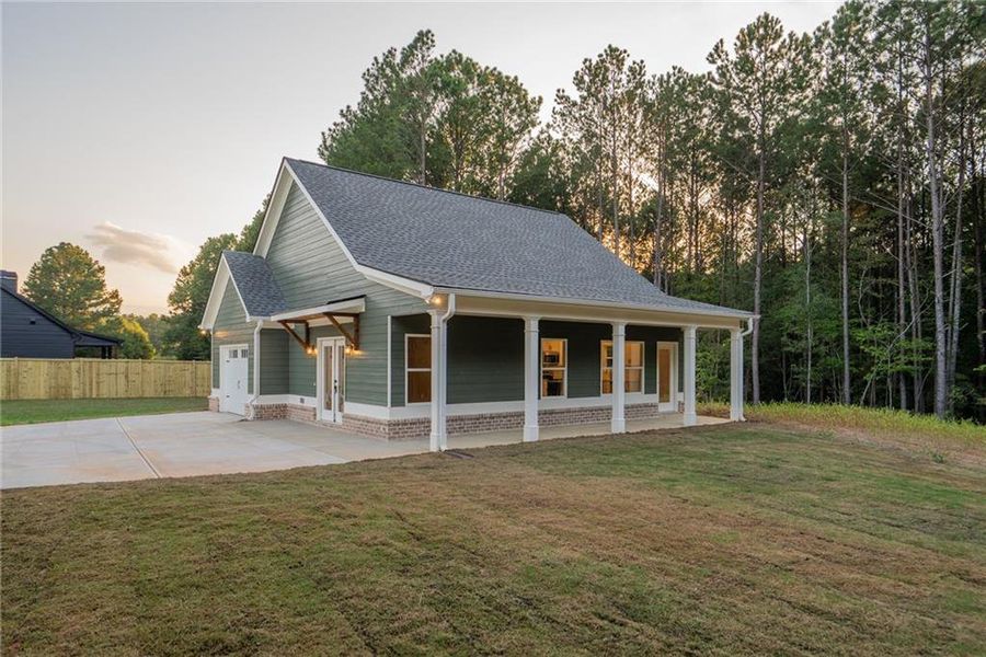 Front exterior of a new home in , Social Circle, GA, highlighting curb appeal (Image 23).