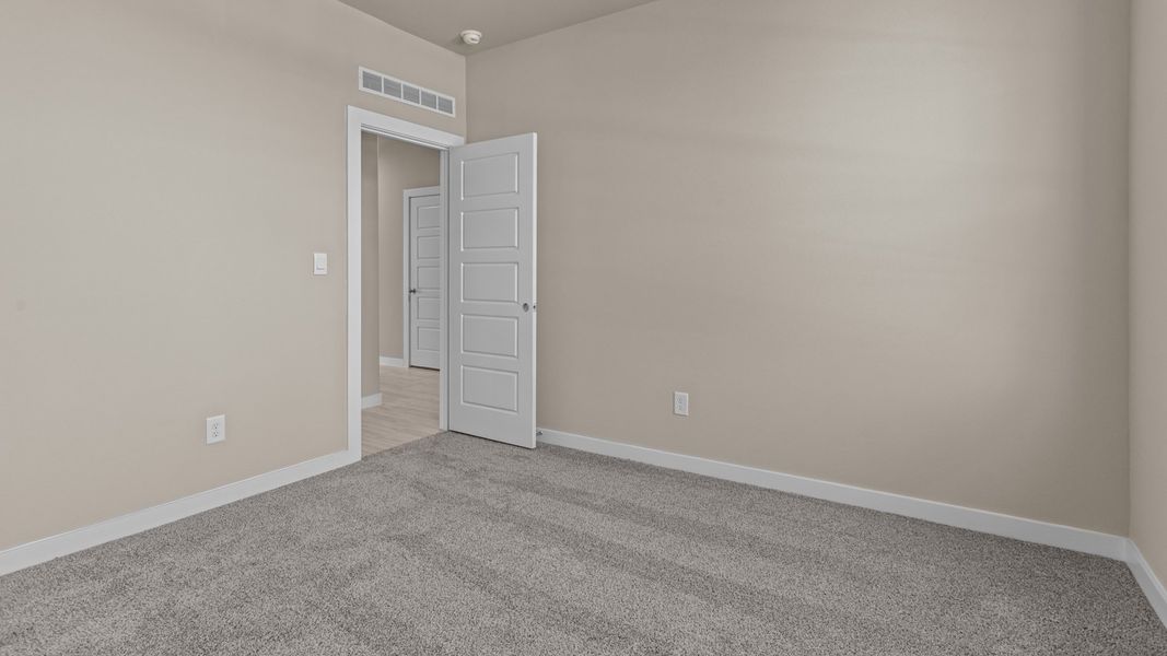 Representative unfurnished interior of a home built from the Tupelo by D.R. Horton in Legacy South, Midland (Image 20). Representative unfurnished interior of a home built from the Tupelo by D.R. Horton in Legacy South, Midland (Image 20).