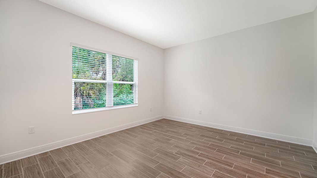 Spacious, unfurnished interior of a new home in Wildleaf Real Estate and Homes for Sale in Parrish, FL - Neal Communities, Parrish (Image 28). Spacious, unfurnished interior of a new home in Wildleaf Real Estate and Homes for Sale in Parrish, FL - Neal Communities, Parrish (Image 28).