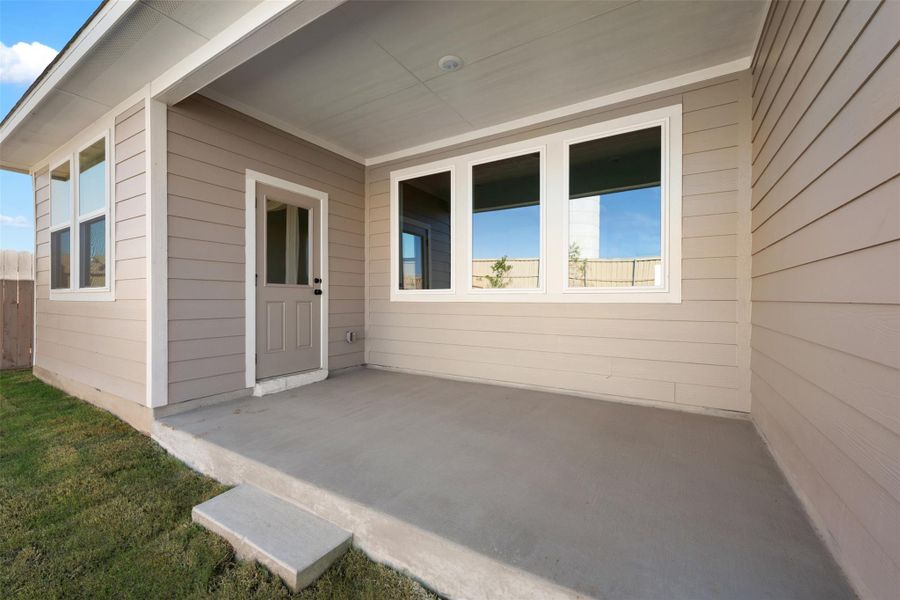 Exterior details and patio area of a home in The Colony 50s, Bastrop (Image 3). Exterior details and patio area of a home in The Colony 50s, Bastrop (Image 3).