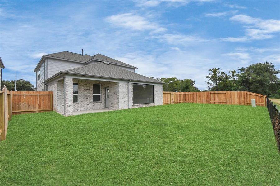 Backyard retreat, offering an abundance of space for kids to play and explore. The possibilities are endless in this outdoor haven, where the joy of open-air activities and family gatherings awaits.