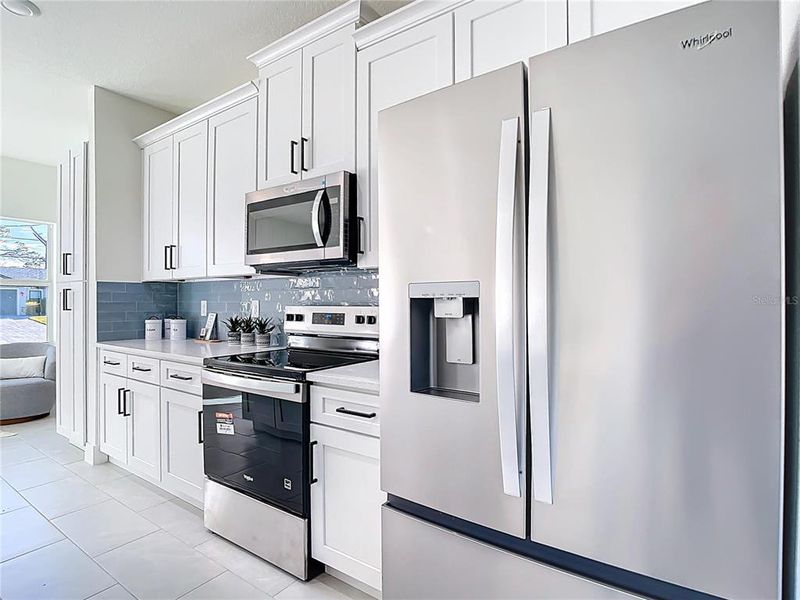 Furnished interior view inside a new home in , Lehigh Acres (Image 12).