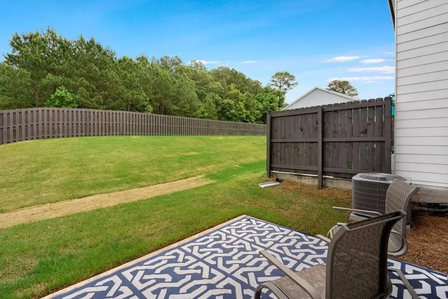 Exterior details and patio area of a home in , Hoschton (Image 29).