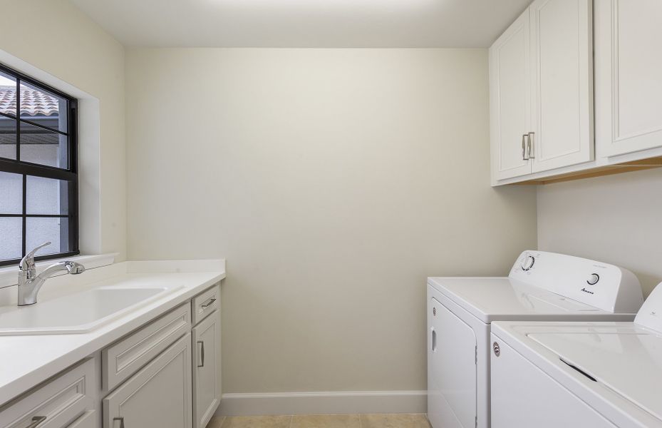 Laundry room with washer/dryer pair