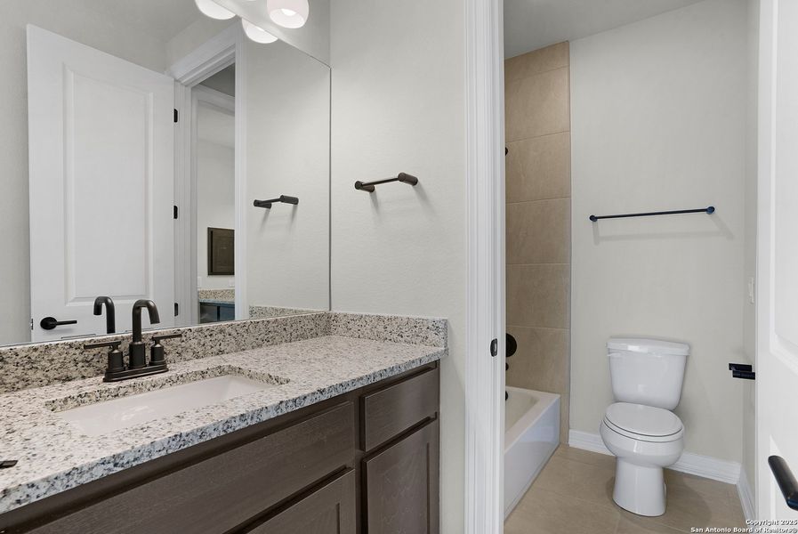 Furnished interior view inside a new home in Nolte Farms, Seguin (Image 17).